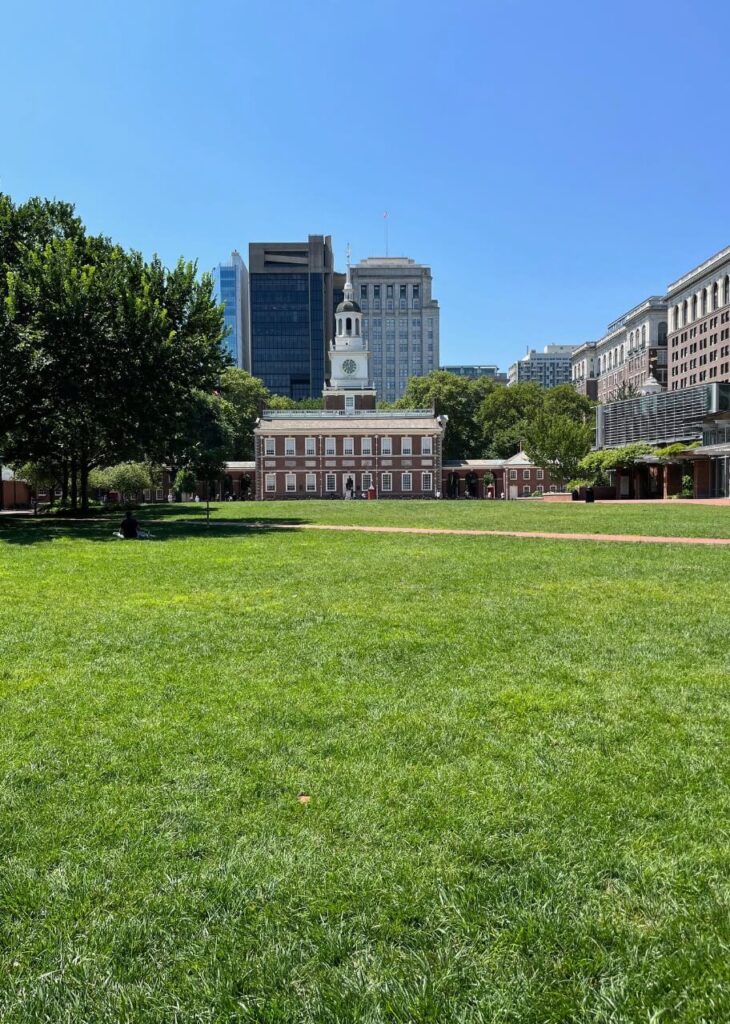 overlooking grass and independence hall in the background. philadelphia. 