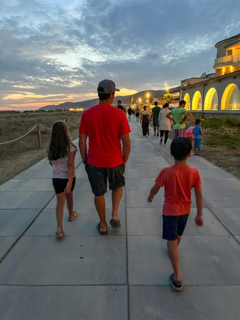 walking along the beach boardwalk in Castelldefels